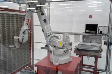 PeakNano makes extensive use of automation for its Optics Division. Robots pick hundreds of multilayer films and stack them in very specific order before they are compressed and formed into lenses.